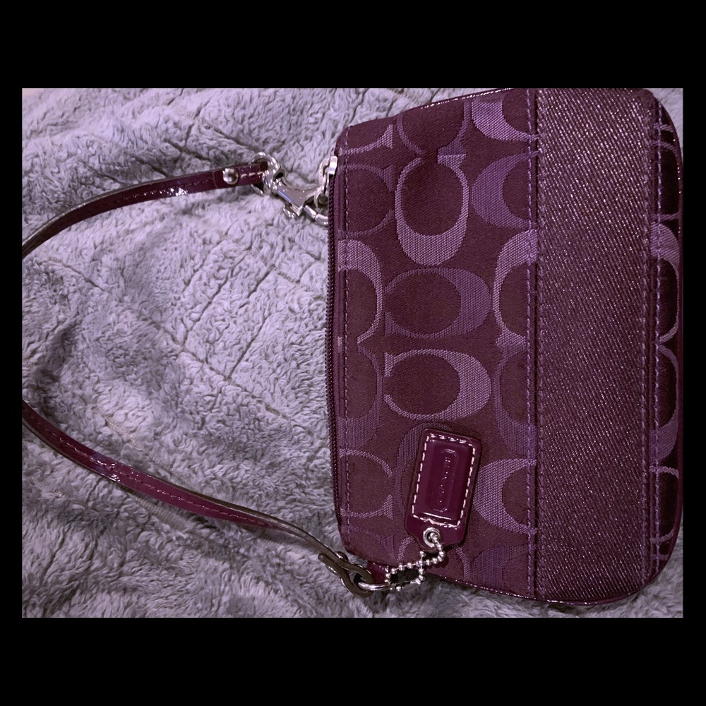 Purple Coach wristlet